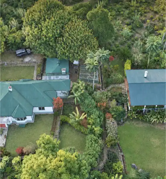 Aerial view of the bungalow, the Library Suite and the gardens between them